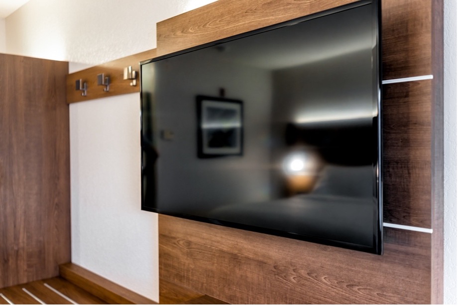 A tv mounted on a wall